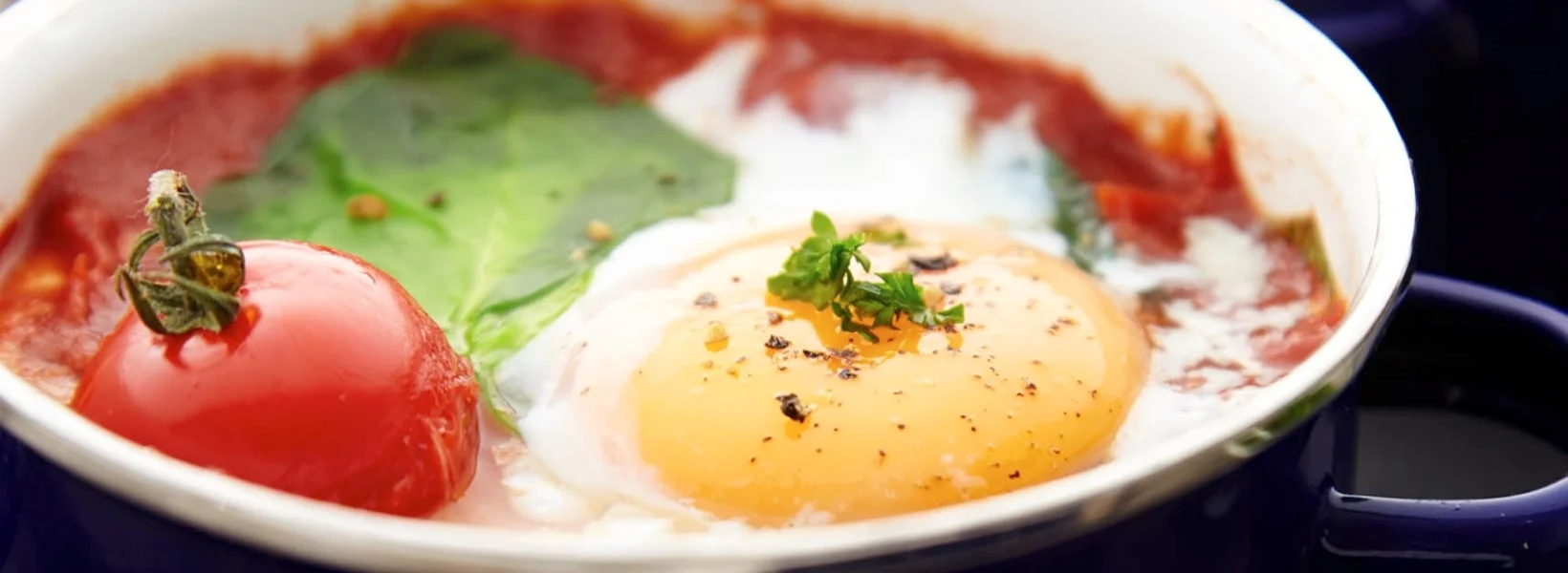 baked-eggs-with-cherry-tomatoes-and-spinach